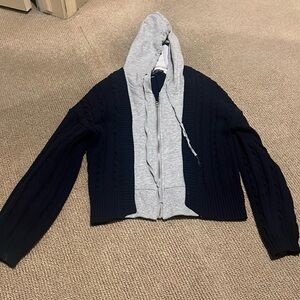 Navy blue sweater with gray zipped insert